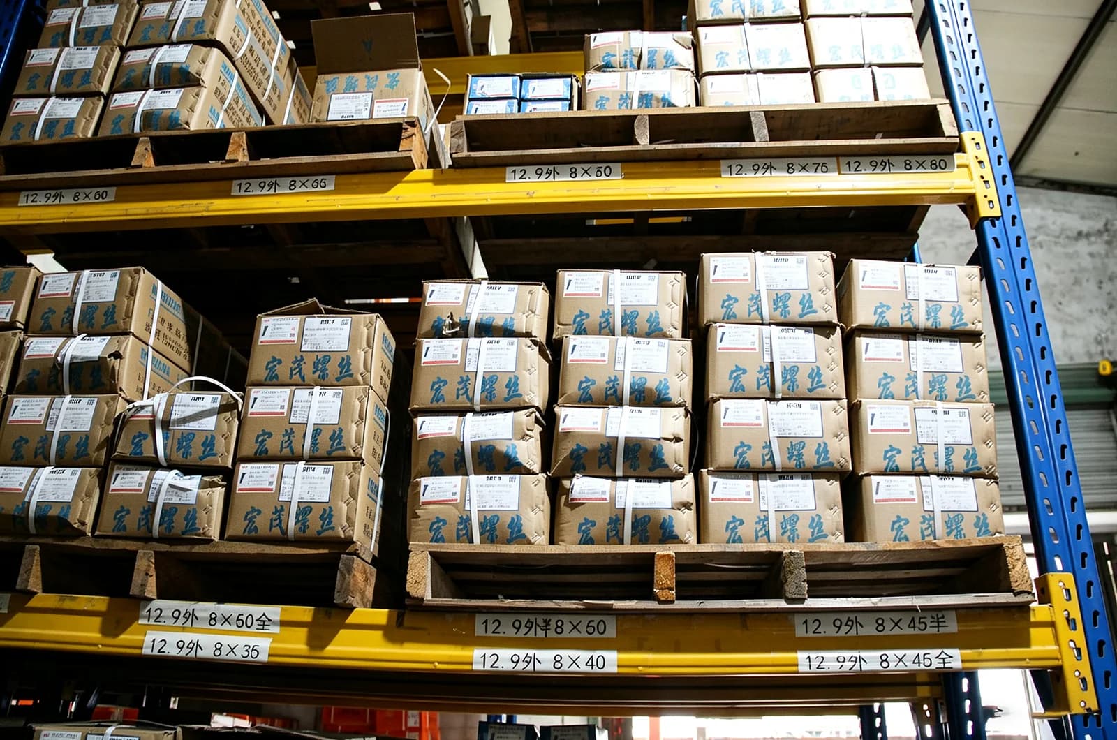 Fastener cartons organized by size on partner warehouse shelving